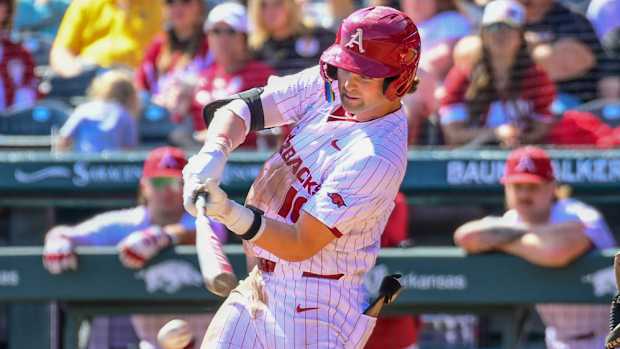 Razorbacks' Peyton Stovall hits pitch against Missouri